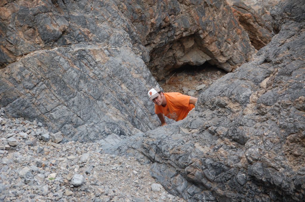 Steve climbing up and over one of the dry falls:
